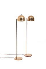 Golvlampor i mässing. Guldfärgade Bergboms lampor med runt kupa