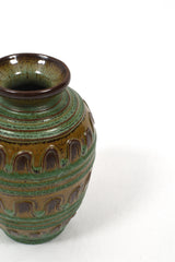 Grön keramikvas med bruna detaljer